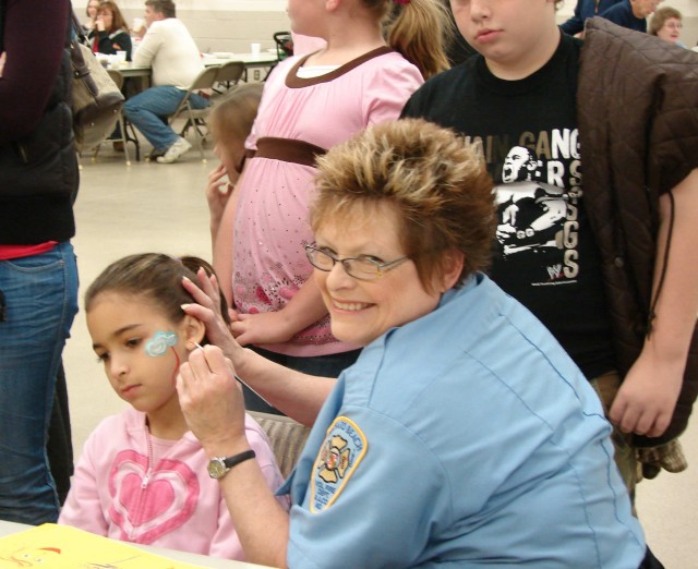 Firefighter Bushong demonstrates her artistic abilities at the 2008 Open House